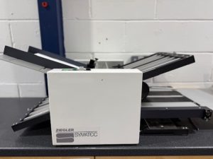 Stago FZM340 - Ziegler Symatec paper folding machine